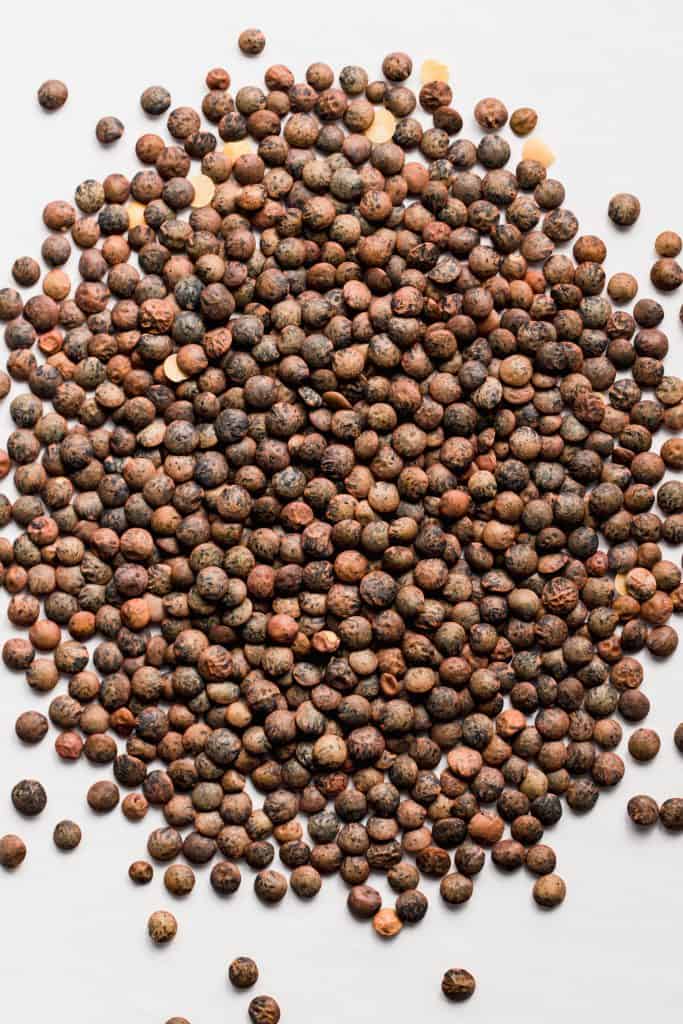 french dried lentils on white background