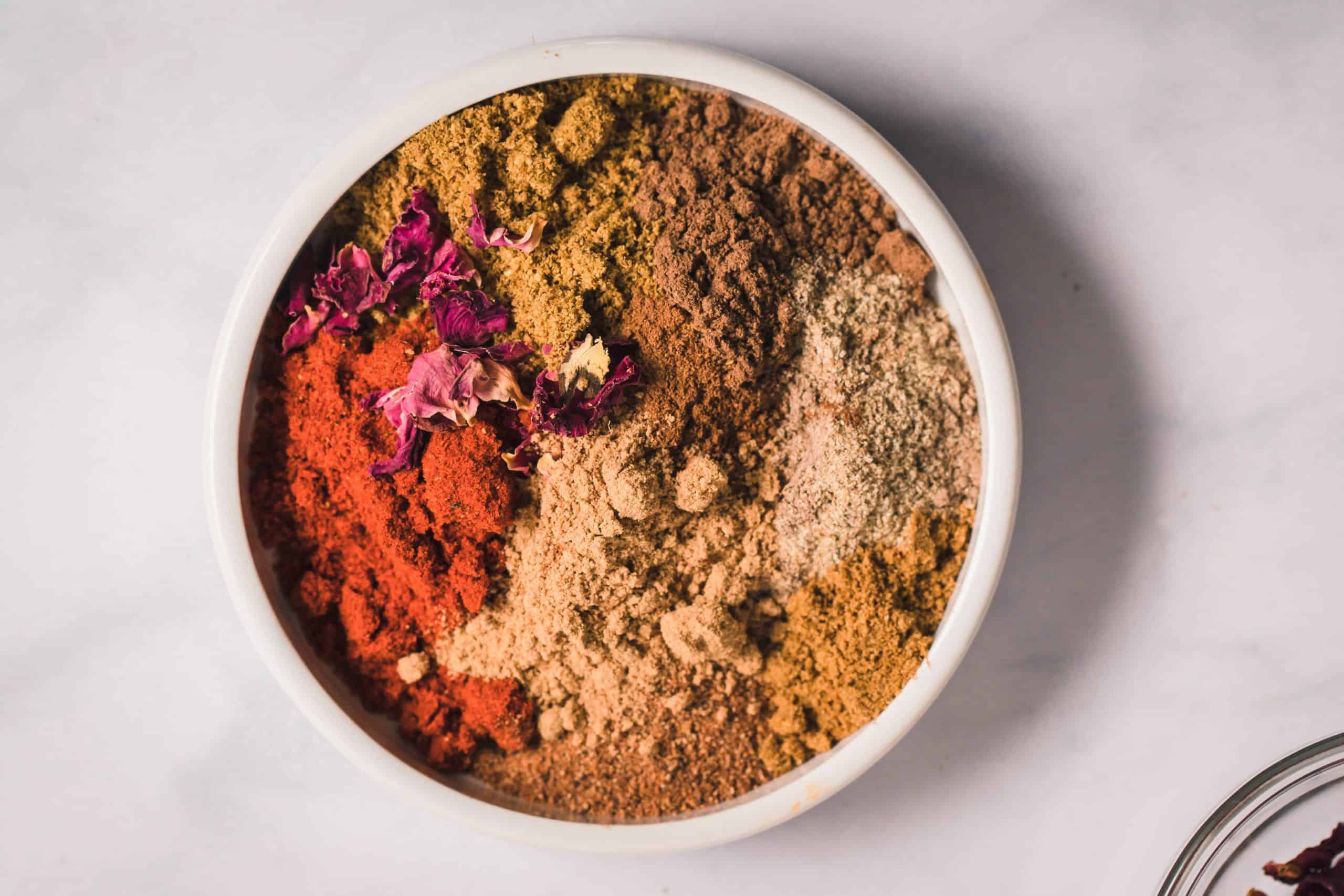 small white bowl of baharat spice blend
