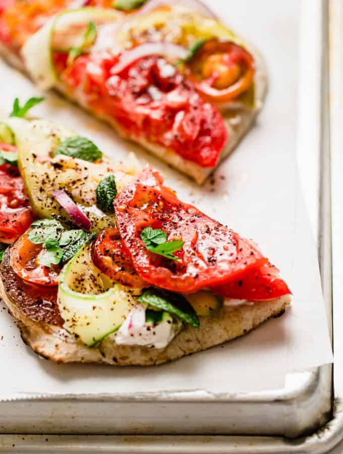 Lebanese Labneh sandwiches topped with heirloom tomatoes